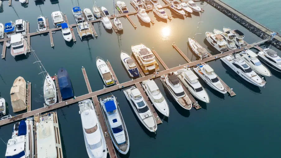 aerial view Yacht Marina in Yacht Club  Aerial luxury boats and yachts in achor park, Luxury Many line of row Yachts at  achor park or marina ocean